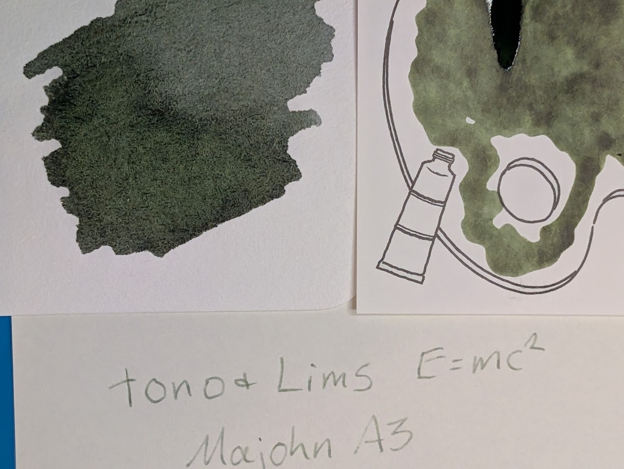 Close up of the center of photo 1, only showing the ink blobs on both cards and the Midori sample.