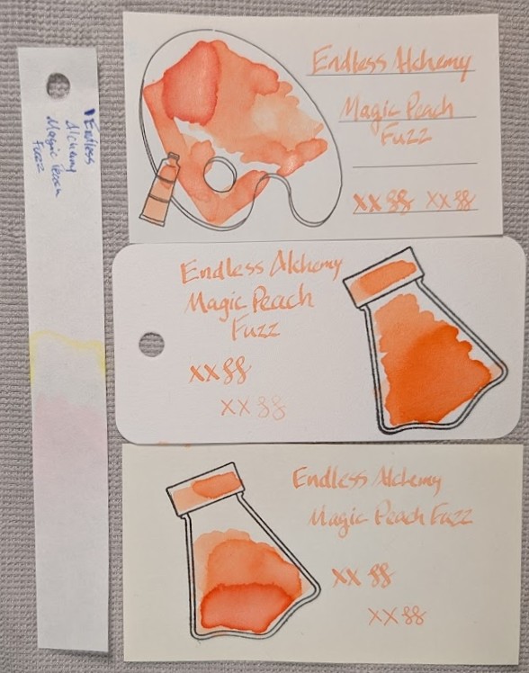 Photo of 3 ink swatches & chromatography strip for Endless Alchemy Magic Peach Fuzz which is a very pale peach colored ink with a little shimmer and some shading. Each swatch contains the ink name followed by "XX" 2 curlicues in both stub and EF widths. Swatch 1: Iroful swatch card with an outline of a paint palette and tube. The palette is mostly filled in with swirls of ink, a few areas are darker with some visible shimmer, and darker edges. There is an outline of a paint tube which is swabbed and looks similar. The writing is very pale and some areas with less ink are even more pale, barely visible. Swatch 2: Col-o-ring swatch card with a stamped outline of an Endless Alchemy ink bottle, which is flask-shaped and tilted. The outlined area is mostly full of an ink blob which is darker at the bottom and paler at the top in a gradient. Shimmer is visible only in the darkest area. Swab across "cap" is similar. The stub writing sample is slightly darker than on Iroful, but the EF is more pale. Swatch 3: Midori MD swatch card with a stamped outline of an Endless Alchemy ink bottle. The outlined area is mostly full of an ink blob which is darker at the bottom and paler at the top but in three distinct areas. Shimmer is visible only in the darkest area. Swab across "cap" is similar. Text is even more pale with pronounced shading. Chromatography is barely visible, pink first then some yellow.