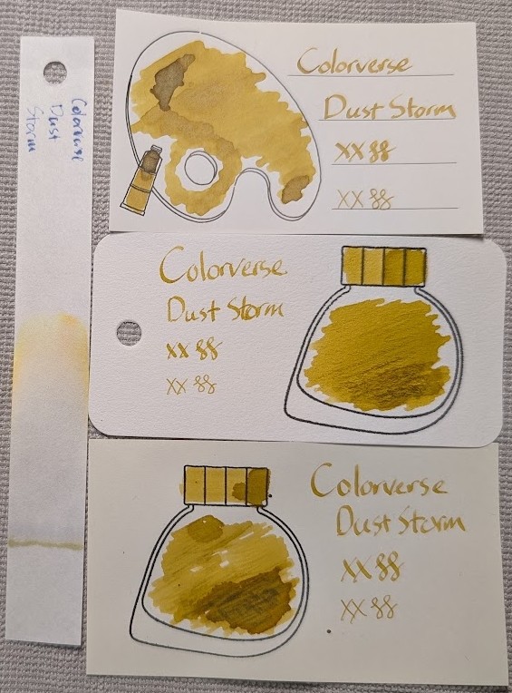 Photo of 3 ink swatches & chromatography strip for Colorverse Dust Storm which is a mustard yellow and maybe vaguely tan colored ink with minimal shading. Each swatch contains the ink name followed by "XX" 2 curlicues in both stub and EF widths. Swatch 1: Iroful swatch card with an outline of a paint palette and tube. The palette is mostly filled in with swirls of ink, a few small areas are darker with even darker edges. There is an outline of a paint tube which is swabbed and looks similar. The writing has a tiny bit of shading across letters with wider lines. Swatch 2: Col-o-ring swatch card with a stamped outline of a Colorverse ink bottle, which is teardrop-shaped with the point at the bottom left. The outlined area is mostly full of an ink blob which is darker at the bottom and paler at the top in a gradient. Swab across "cap" is similar, but not as dark. Again, the words in the sample have a little shading, but not much. Swatch 3: Midori MD swatch card with a stamped outline of a Colorverse ink bottle. The outlined area is mostly filled in with swirls of ink, a few areas are darker with even darker edges. Swab across "cap" is similar. As with the others, the text has minimal shading. Chromatography is faint but visible on most of the strip, there is a line of yellow where it started. A large faint area of blue-gray. Then blends into faint yellow and orange areas before fading away completely.